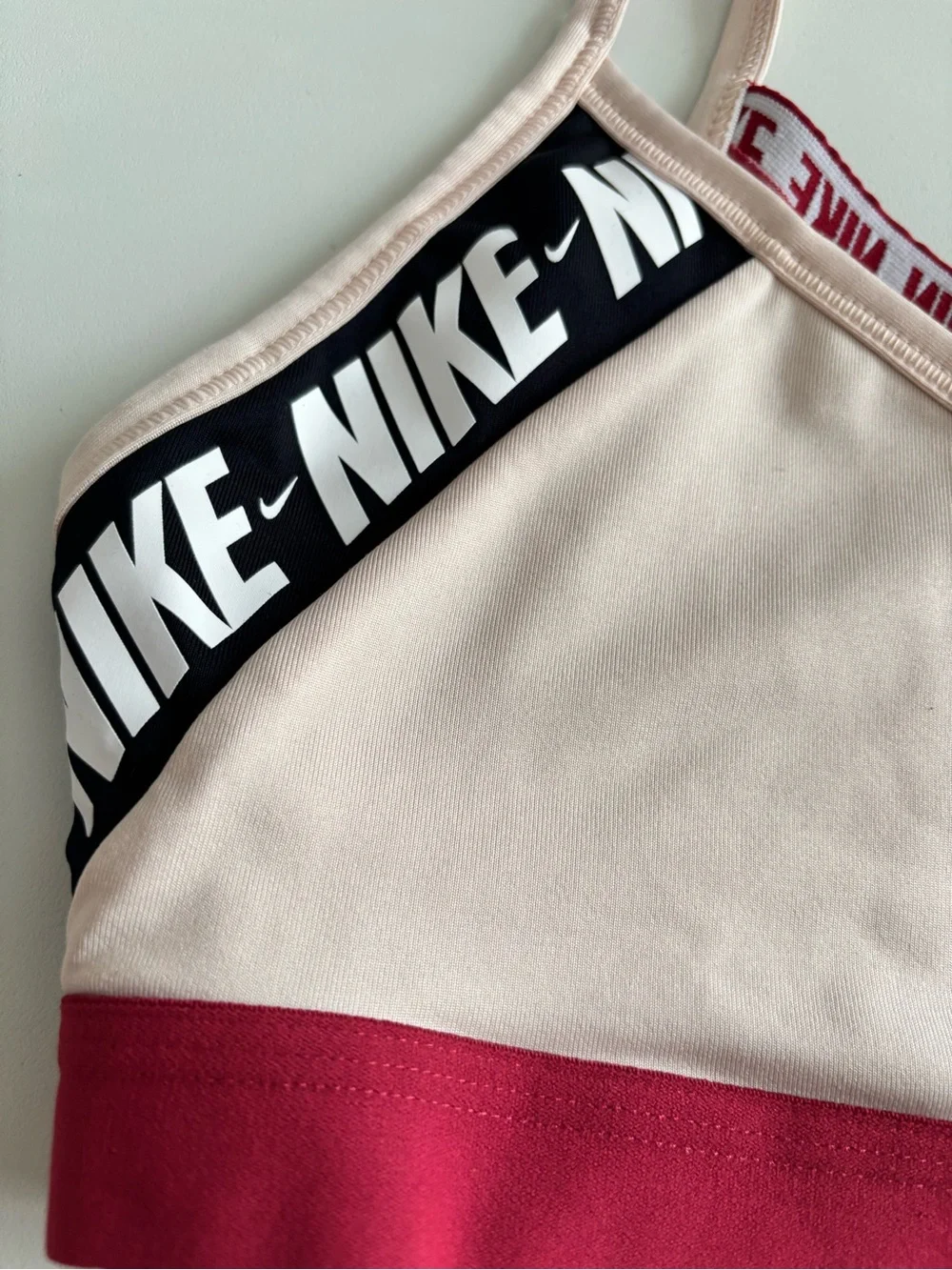 Big Girls Nike Pink Sports Bra with Maroon Band and Black Logo Trim